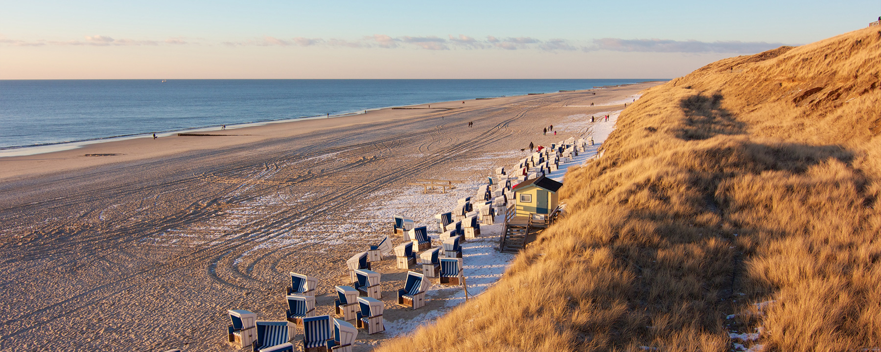 Die Insel Sylt beeindruckt mit eleganten Dünen und exklusiven Boutiquen